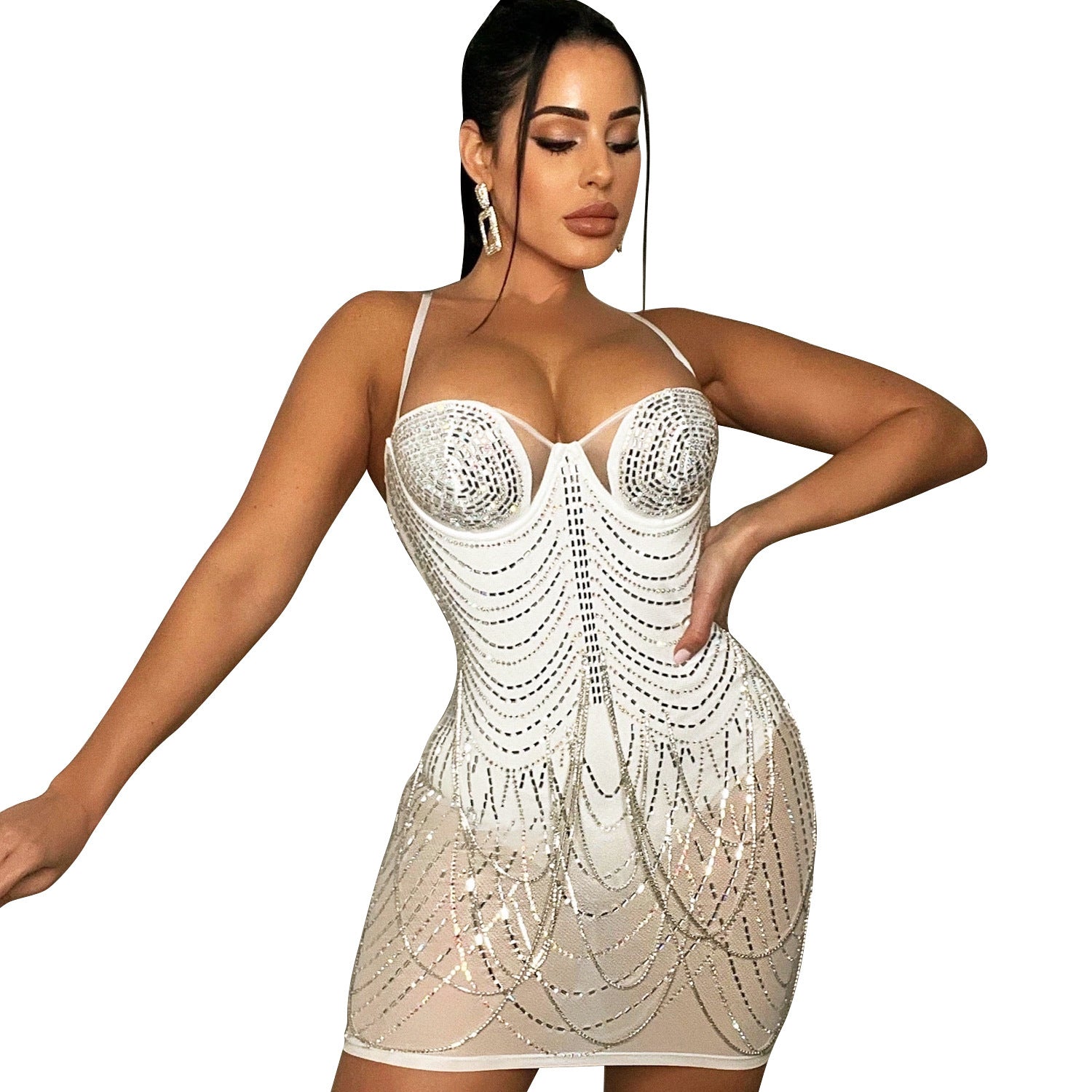 a woman wearing a white bodysuit with sequins