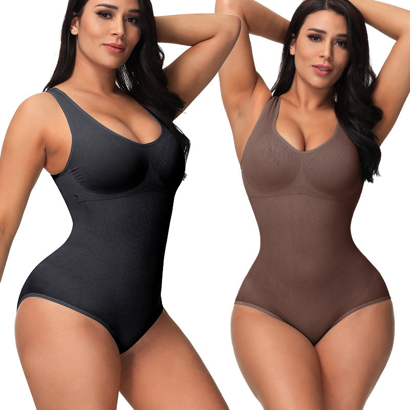 two women in bodysuits posing for the camera