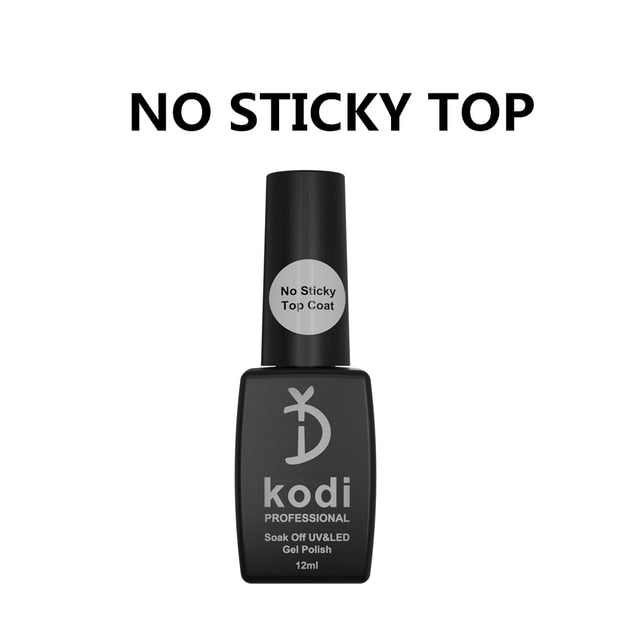 a bottle of kodi nail polish sitting on top of a table